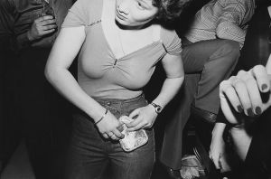 Tony_Ward_Early_work_documentary_photography_Night_Fever_Rochester_New_York_Club_747_fashion_disco_accessories_dirty_dancing_grinding_group_erotic_70's_clublife_fun_nightlife_womens_purse_cleavage.jpg