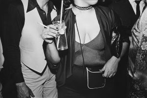 Tony_Ward_Early_work_documentary_photography_Night_Fever_Rochester_New_York_Club_747_fashion_disco_accessories_dirty_dancing_grinding_group_erotica_youth_hispanic_women_big_breasts_smoking-c1.jpg